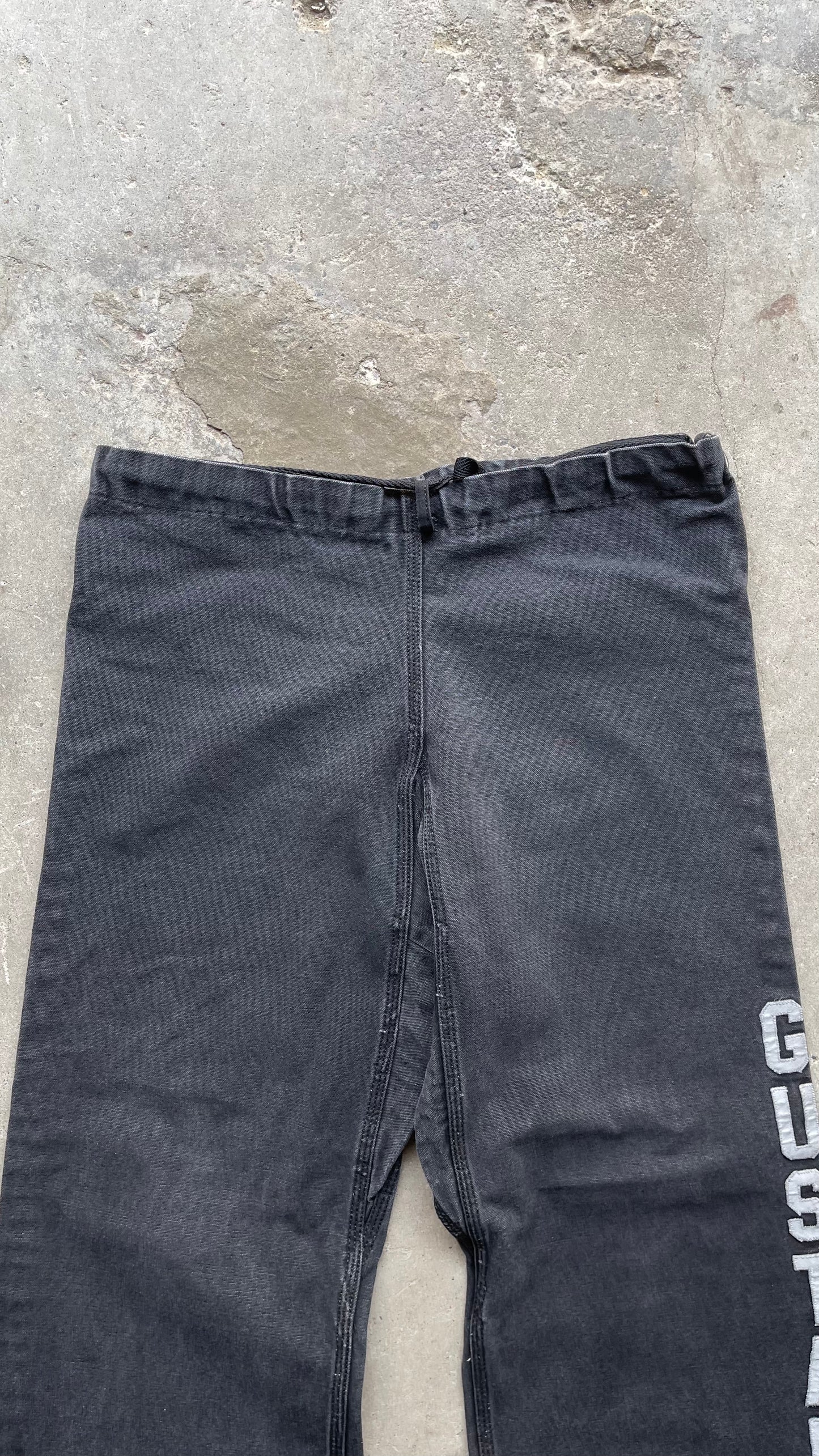 1990S FADED "GUSTAGSON" BAGGY PANTS